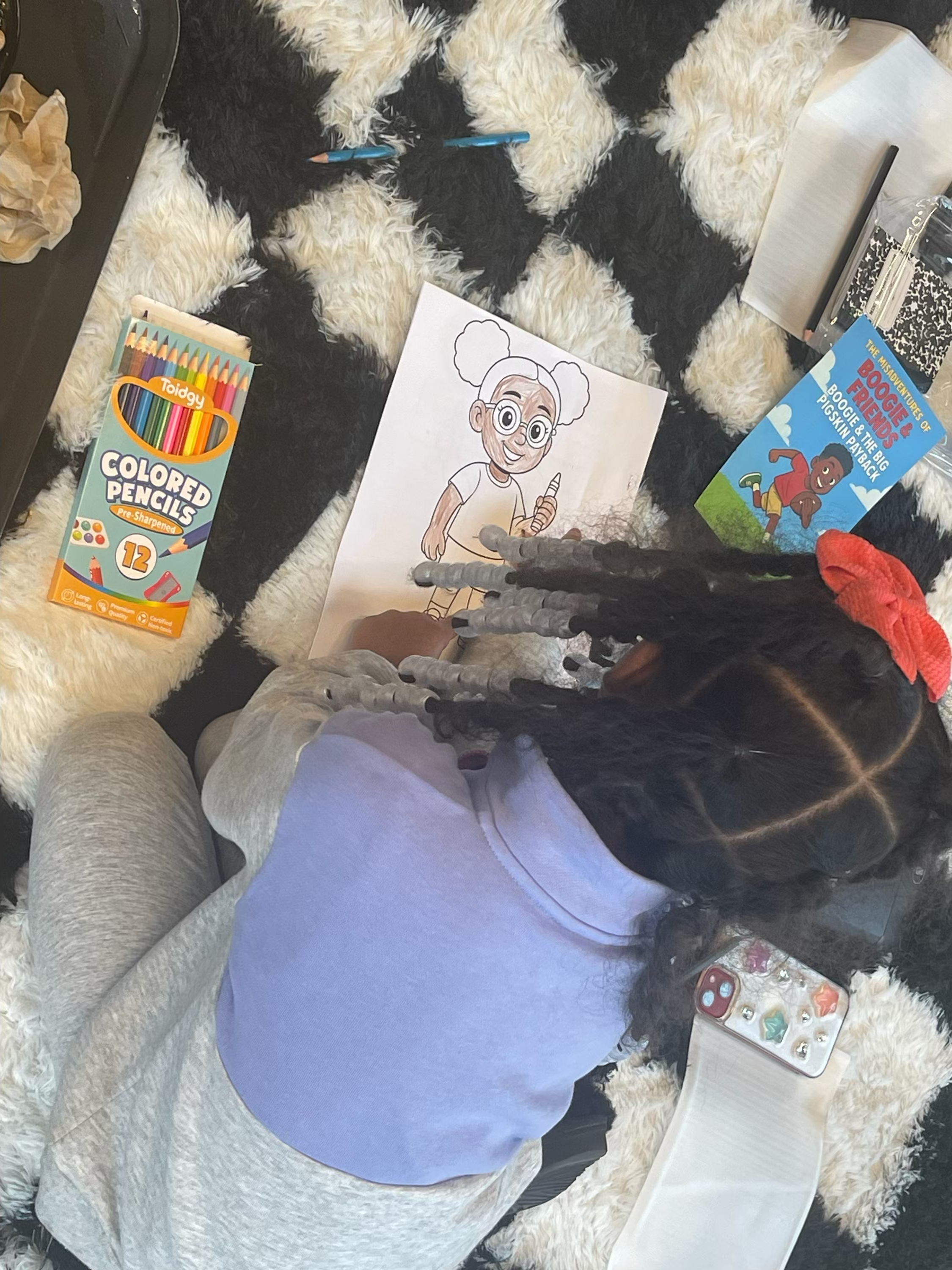 Child coloring during creative time